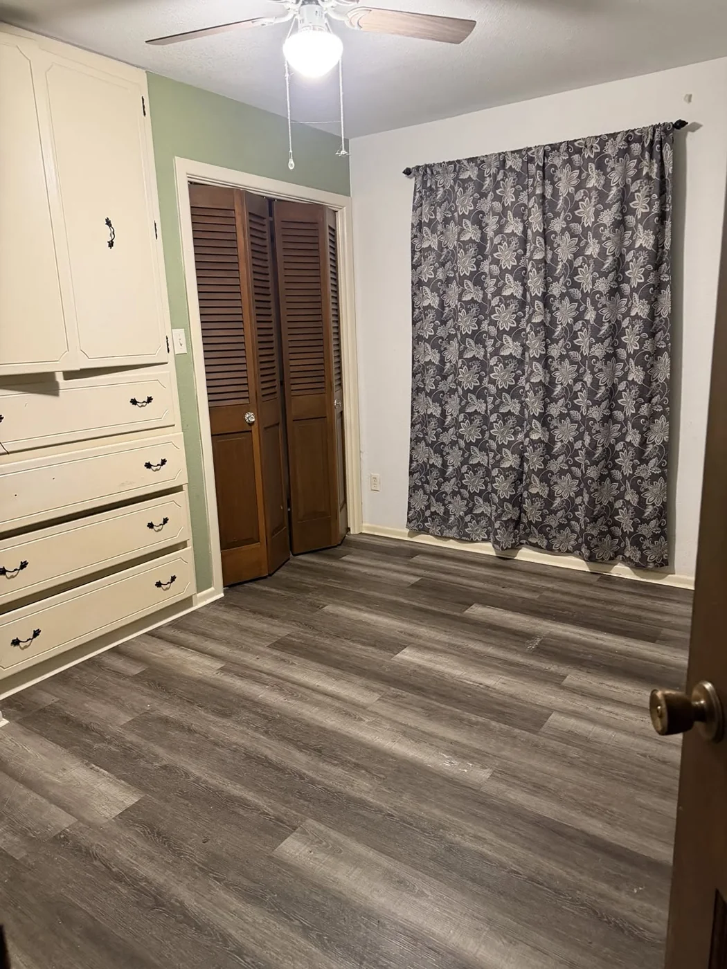 Room with wood-look floors from a local cleaning visit